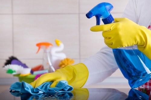 Commercial office cleaning in Greenwich with desks and shared areas being maintained