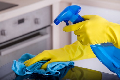 Office cleaning team servicing a Greenwich workplace reception and common area